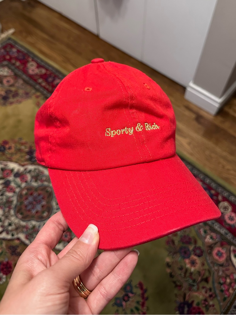 Sporty & Rich Red Baseball Cap with Gold Logo